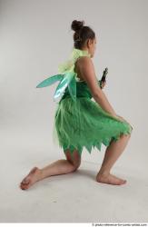 KATERINA KNNELING POSE WITH SWORD